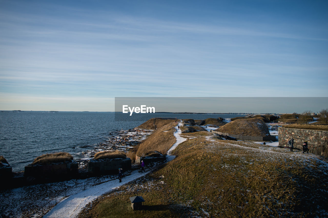 High angle view of shore against sky