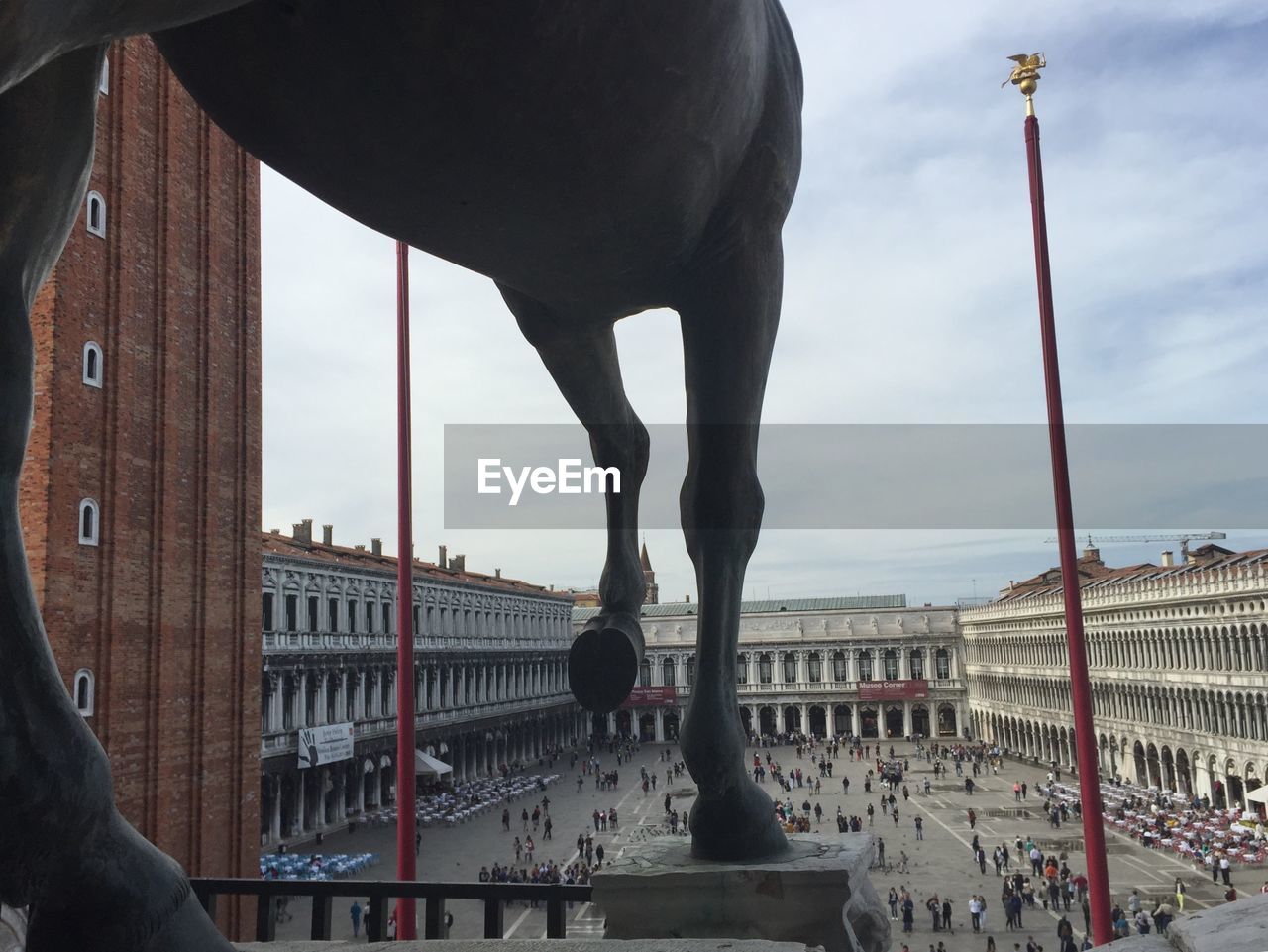 High angle view of crowd at piazza san marco against sky in city