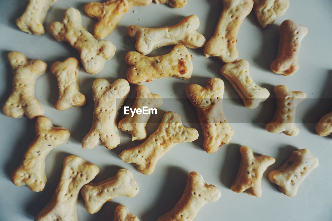 Full frame shot of dog biscuits on table