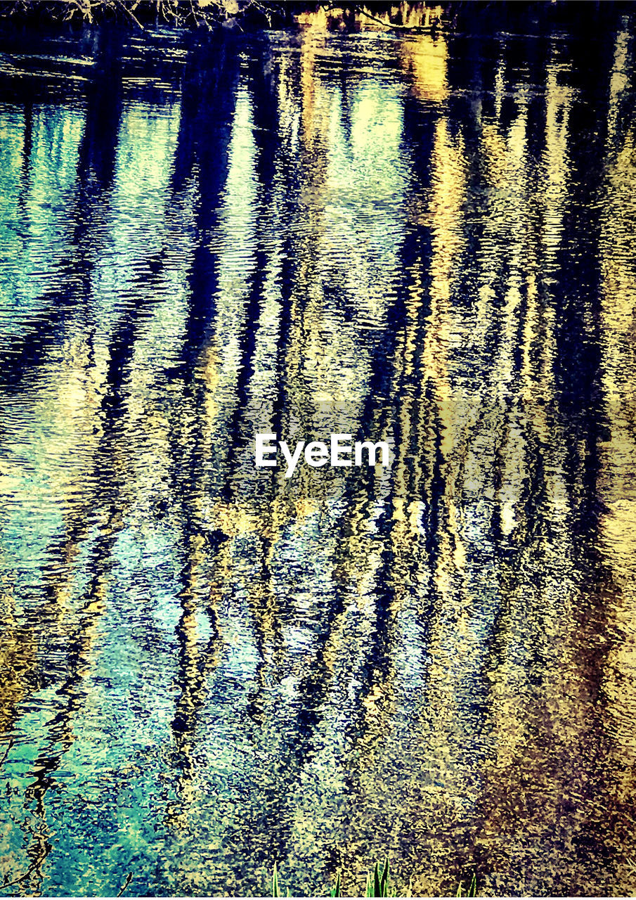 FULL FRAME SHOT OF WET RIPPLED WATER IN LAKE