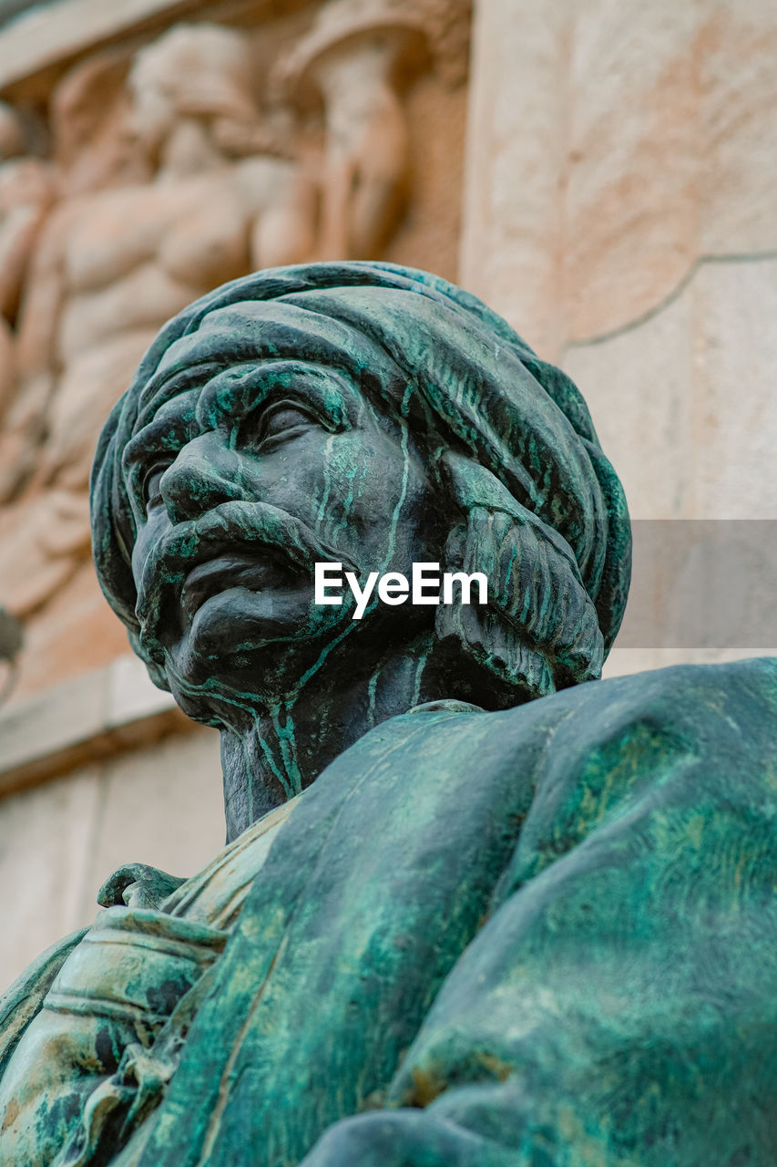 green, sculpture, blue, statue, art, architecture, monument, representation, human representation, craft, temple, no people, creativity, travel destinations, history, close-up, the past, day, outdoors, religion, built structure