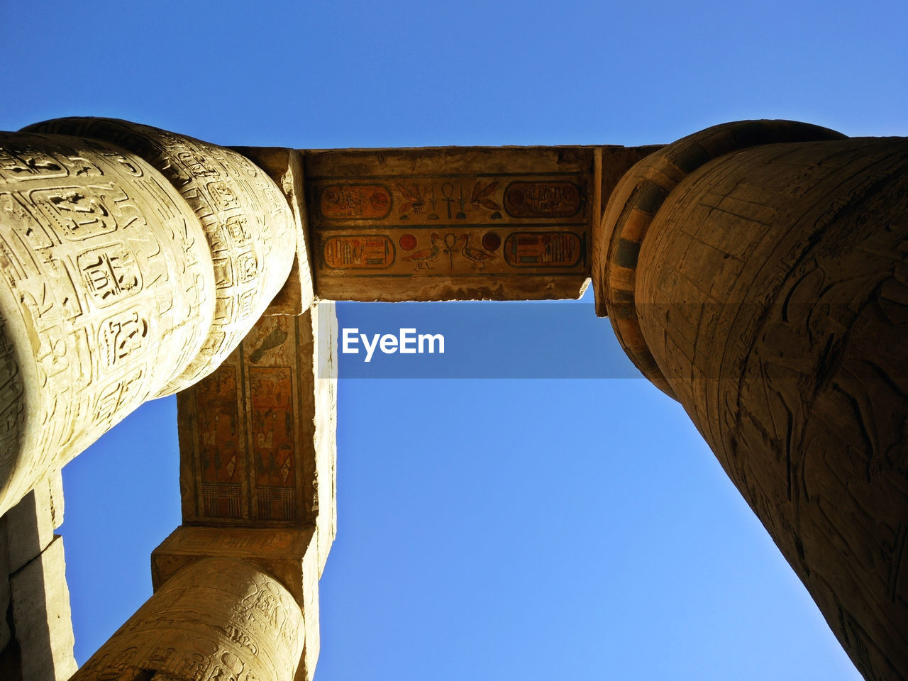 Low angle view of historical building against blue sky