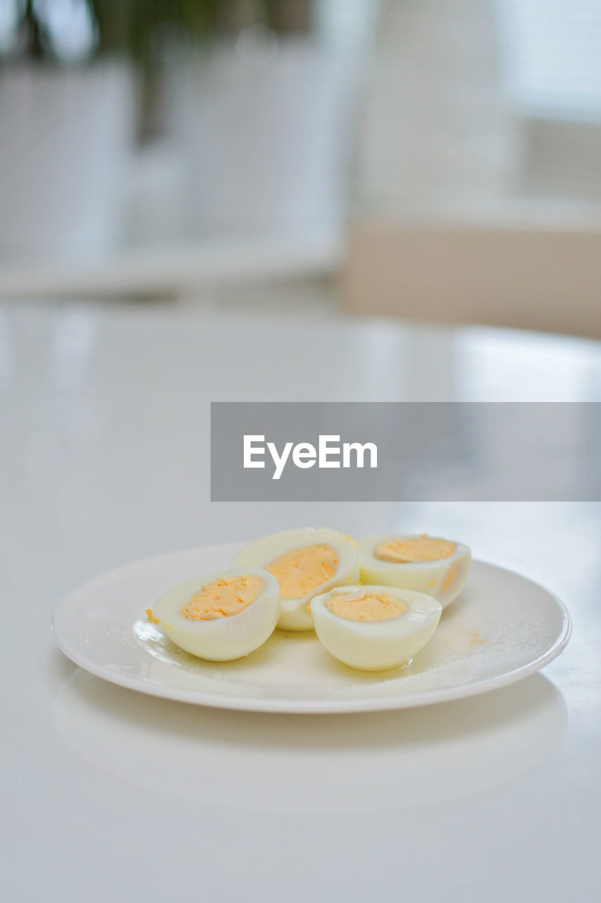 food and drink, food, plate, healthy eating, wellbeing, indoors, freshness, table, breakfast, egg, no people, meal, focus on foreground, produce, yellow, tableware, dishware, close-up, white, day, still life, ceramic