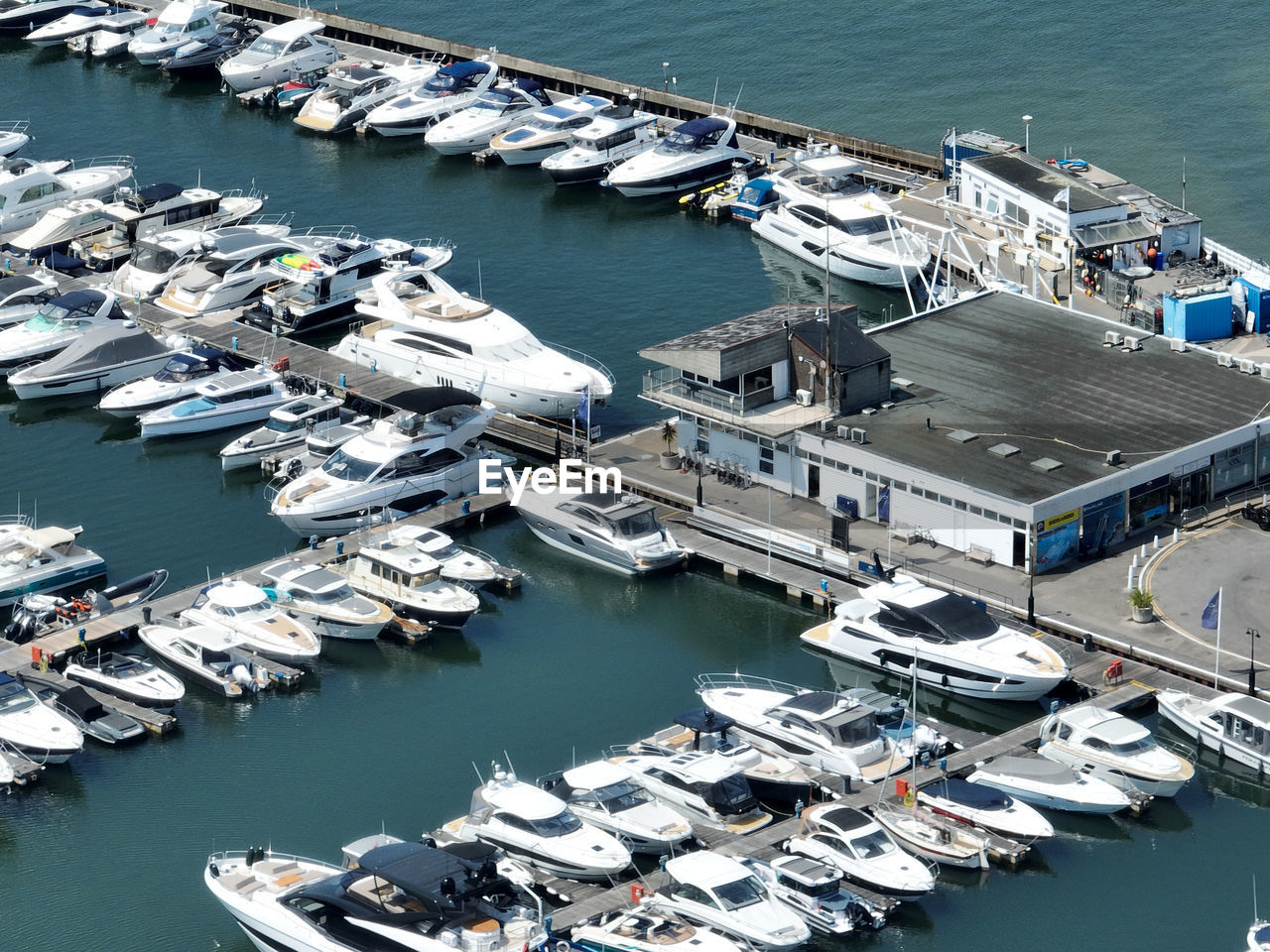 marina, nautical vessel, water, transportation, dock, port, mode of transportation, high angle view, harbor, moored, sea, vehicle, ship, no people, architecture, pier, aerial view, aerial photography, nature, infrastructure, boat, day, outdoors, city, yacht, travel, watercraft, large group of objects, travel destinations, building exterior