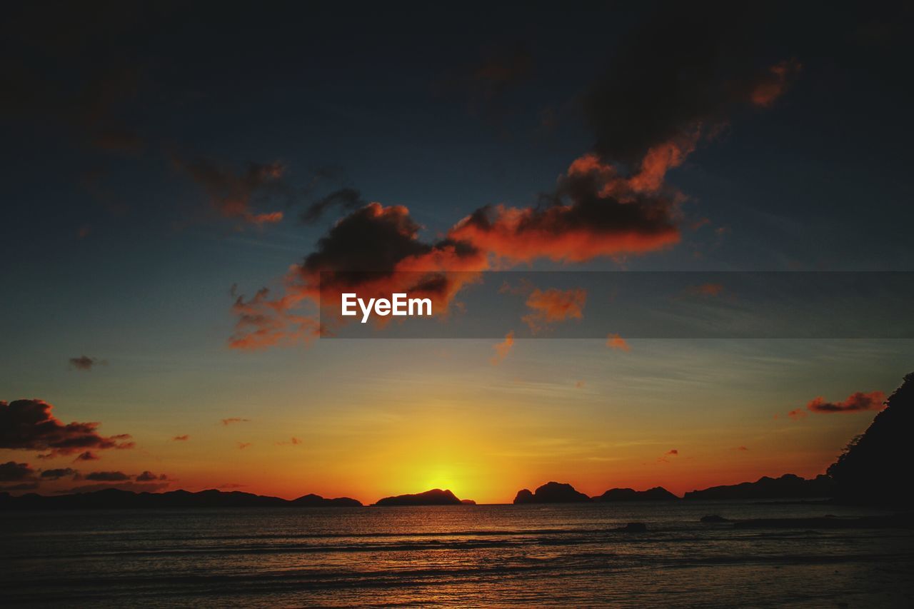 Scenic view of sea against sky during sunset