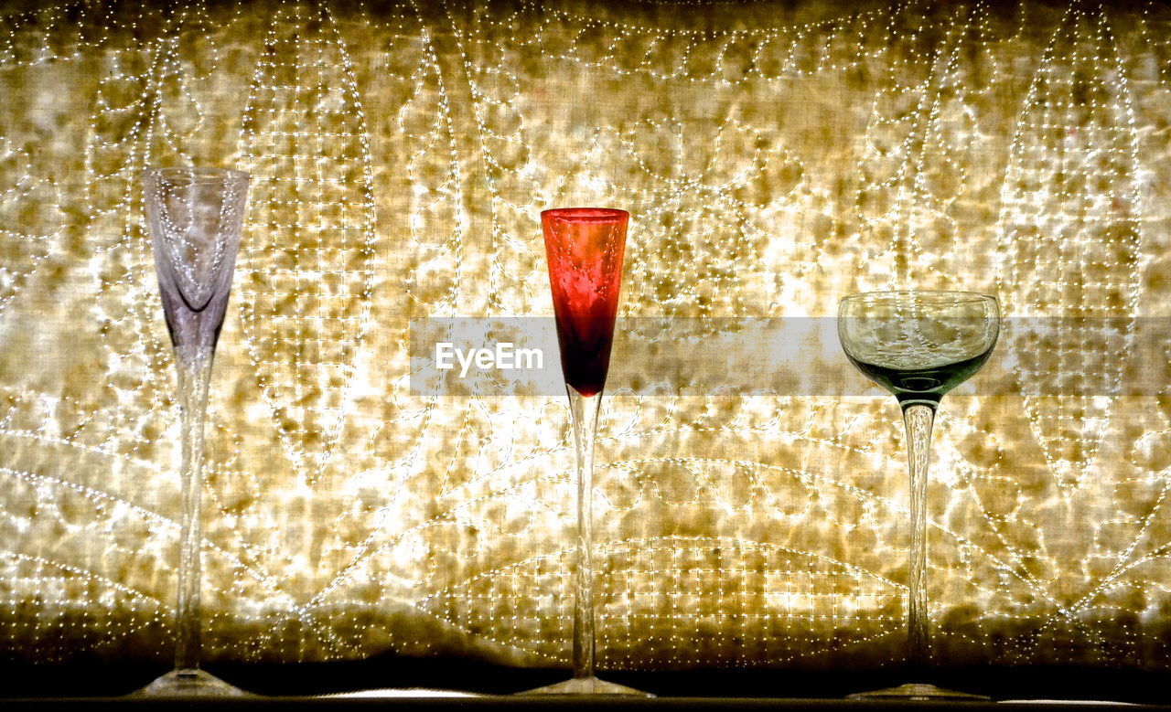 CLOSE-UP OF WINE ON GLASS