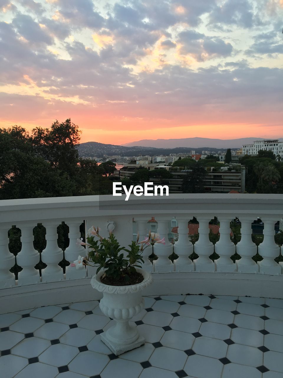 Scenic view of balcony against sky during sunset