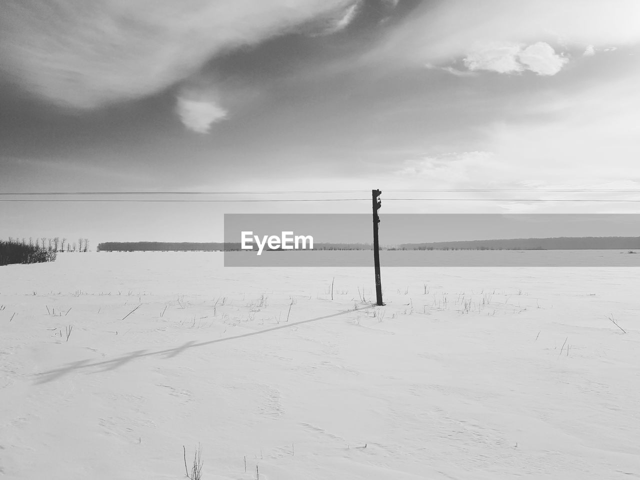 Scenic view of snow field against sky