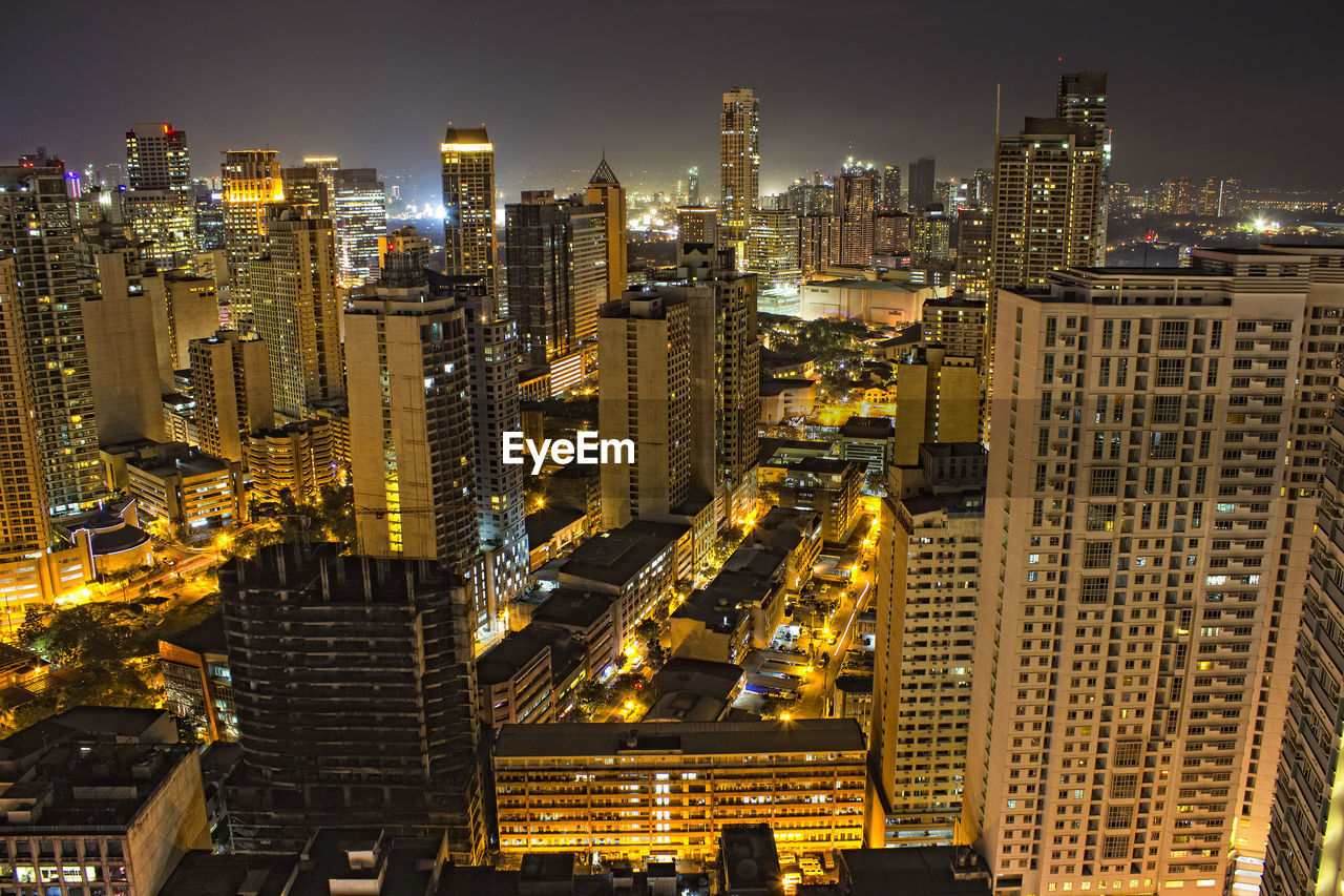 High angle view of illuminated cityscape at night