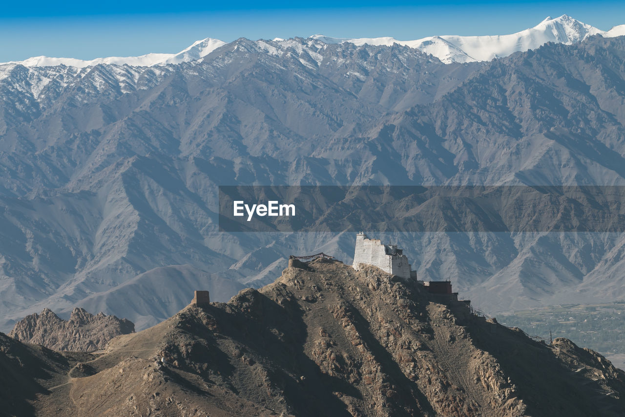Scenic view of snowcapped mountains against sky