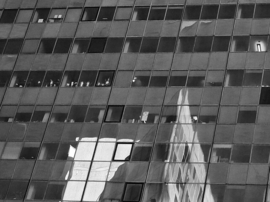 LOW ANGLE VIEW OF MODERN BUILDINGS