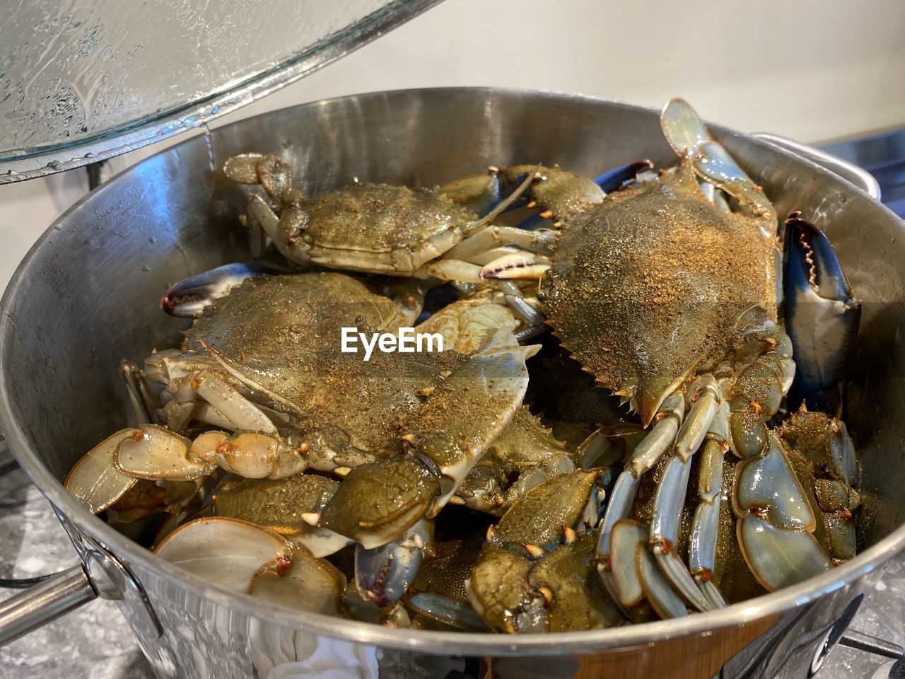 HIGH ANGLE VIEW OF SEAFOOD IN CONTAINER