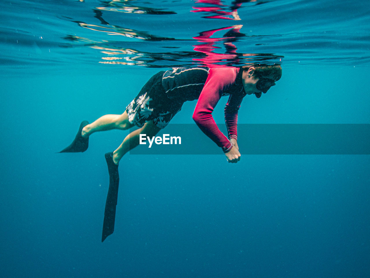 Man swimming undersea