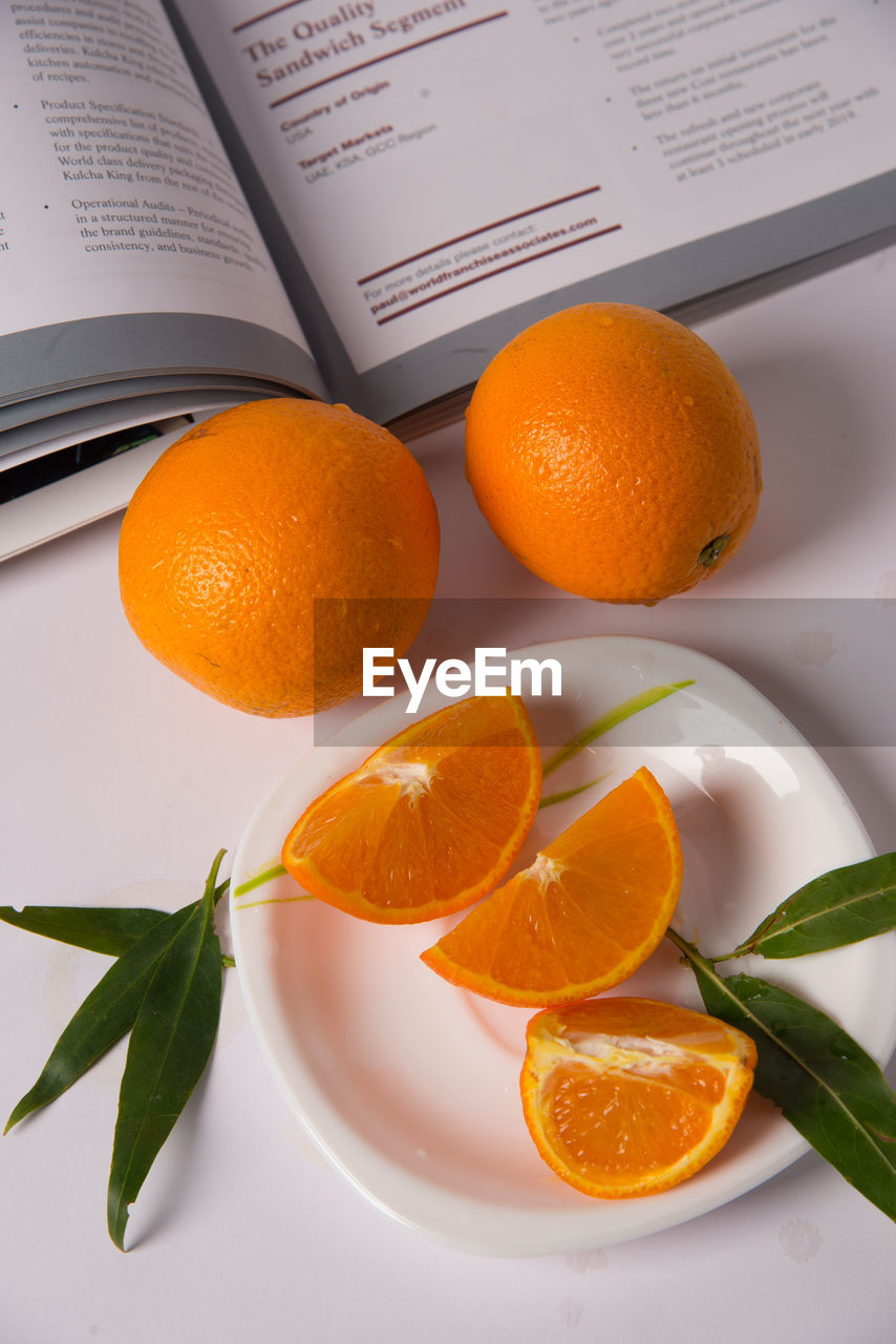 HIGH ANGLE VIEW OF FRUITS ON TABLE