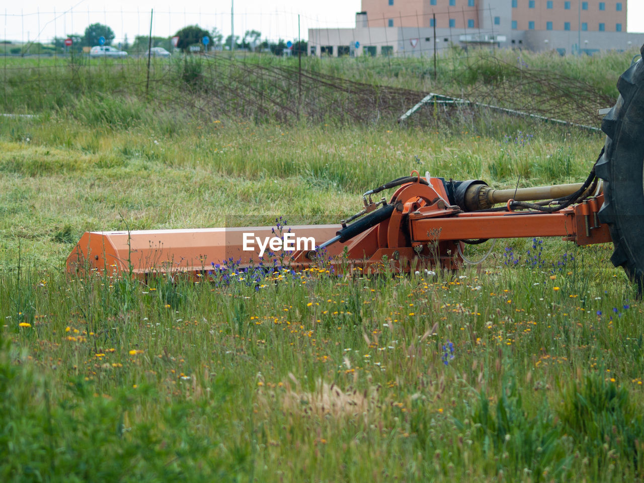 SIDE VIEW OF A VEHICLE ON LAND