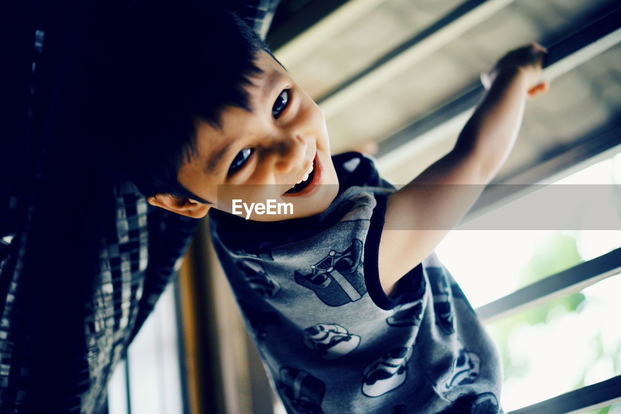 Portrait of cute boy at home