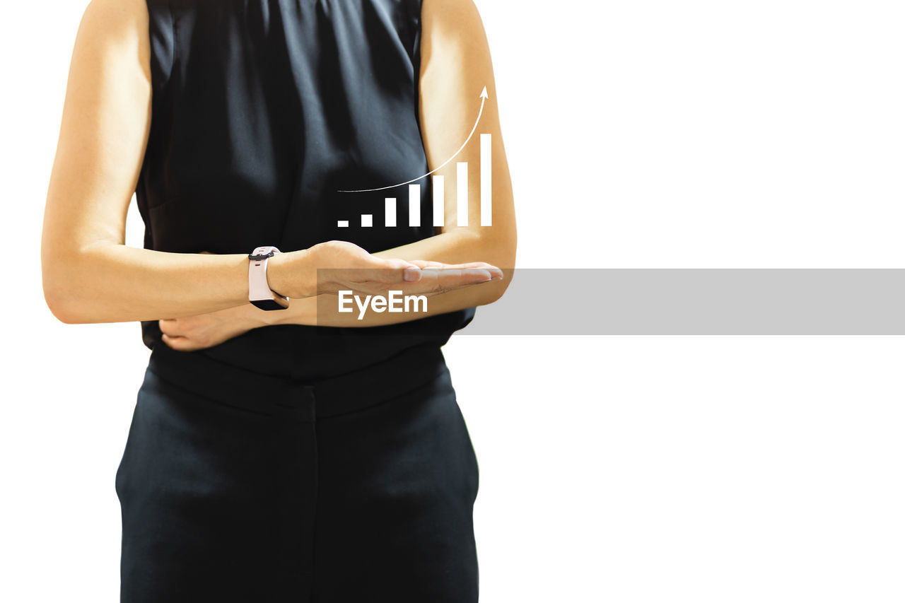 adult, one person, sleeve, clothing, white background, studio shot, midsection, women, standing, indoors, cut out, female, formal wear, black, outerwear, business, copy space, hand, businesswoman, young adult, holding, pocket