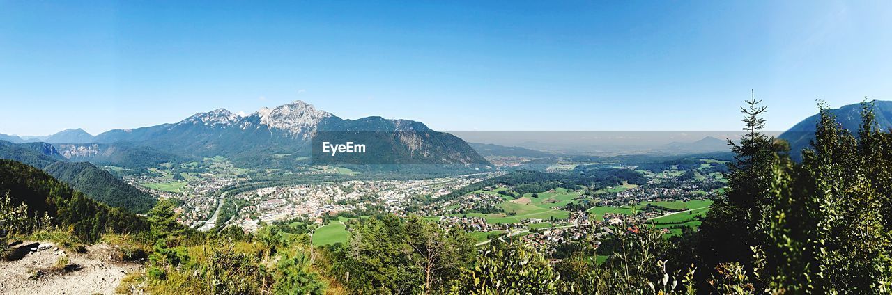 PANORAMIC VIEW OF LANDSCAPE AND MOUNTAINS AGAINST CLEAR BLUE SKY
