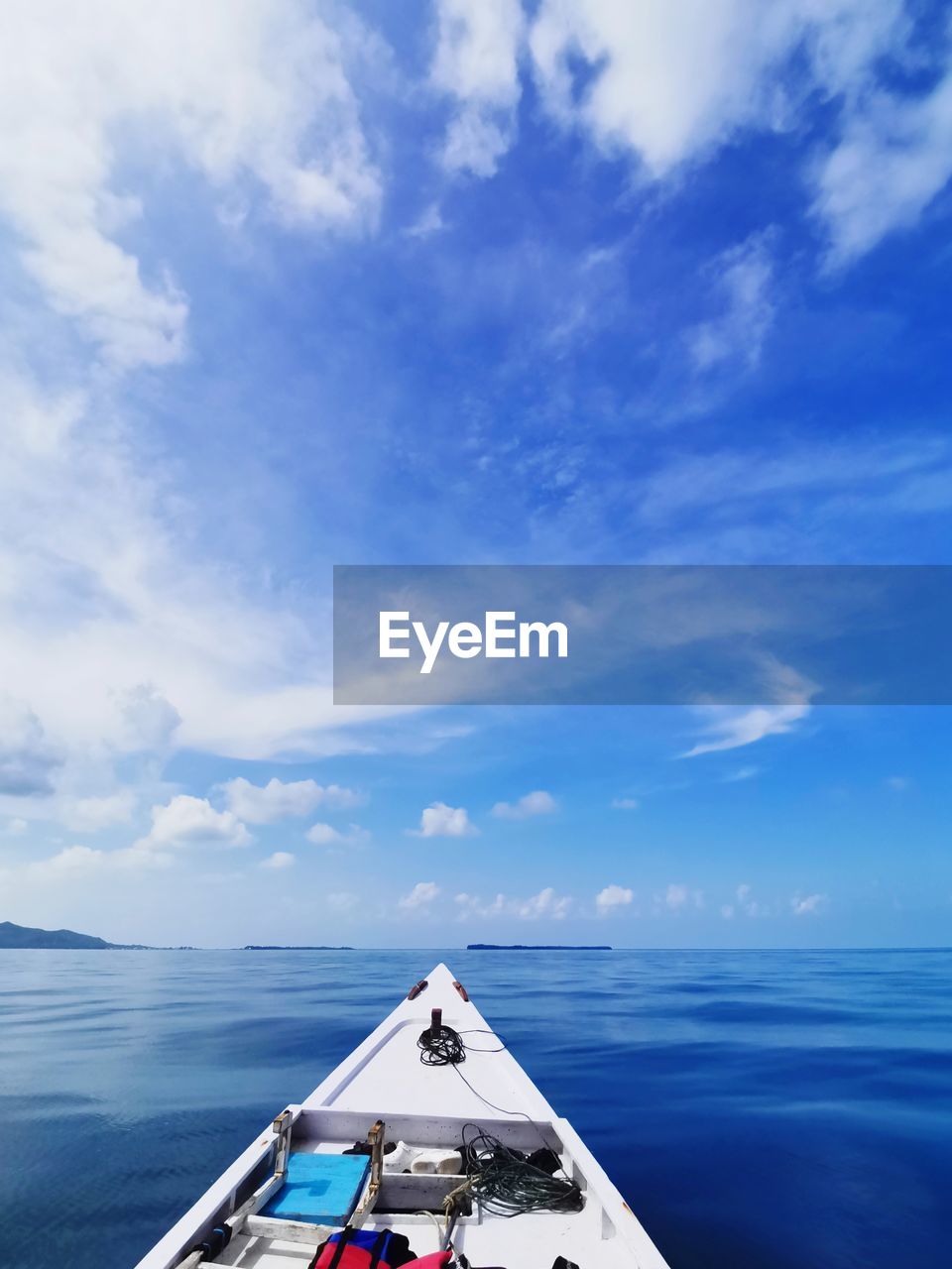 sailboat sailing on sea against sky