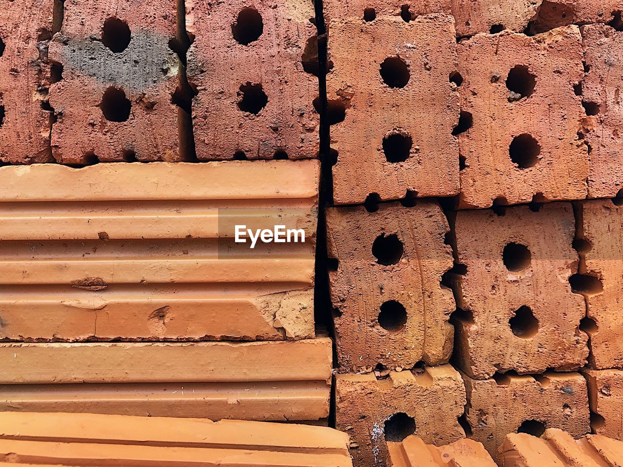 FULL FRAME SHOT OF RUSTY METAL WITH HOLES