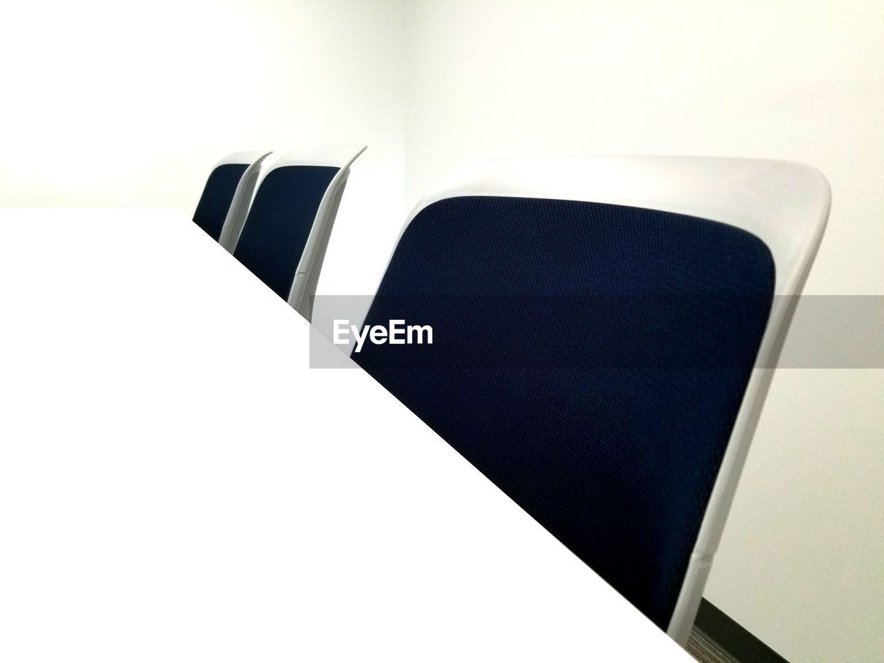 CLOSE-UP OF CHAIR AND TABLE