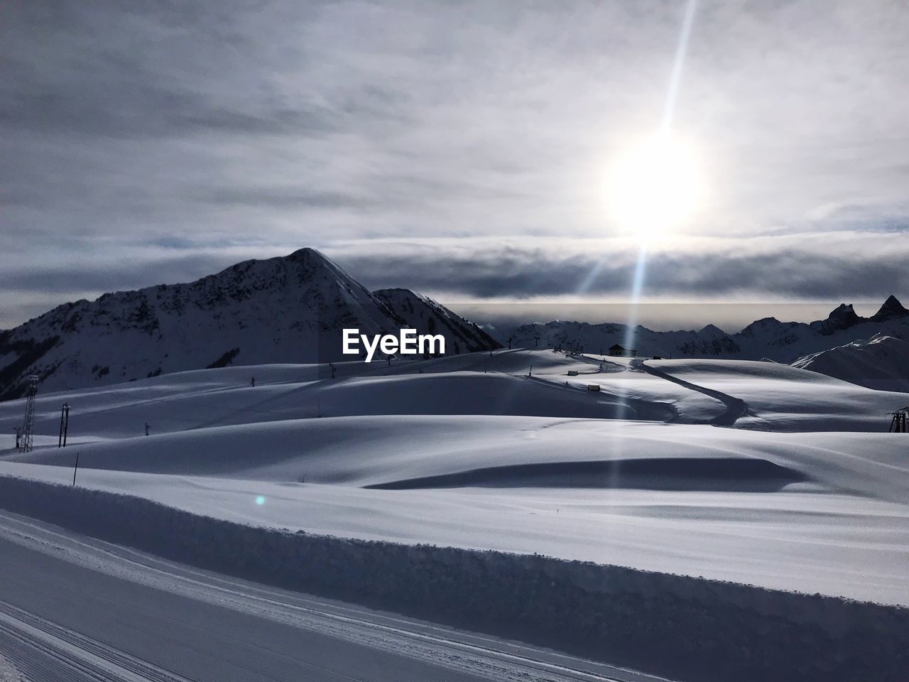 VIEW OF SNOWCAPPED MOUNTAINS AGAINST SKY