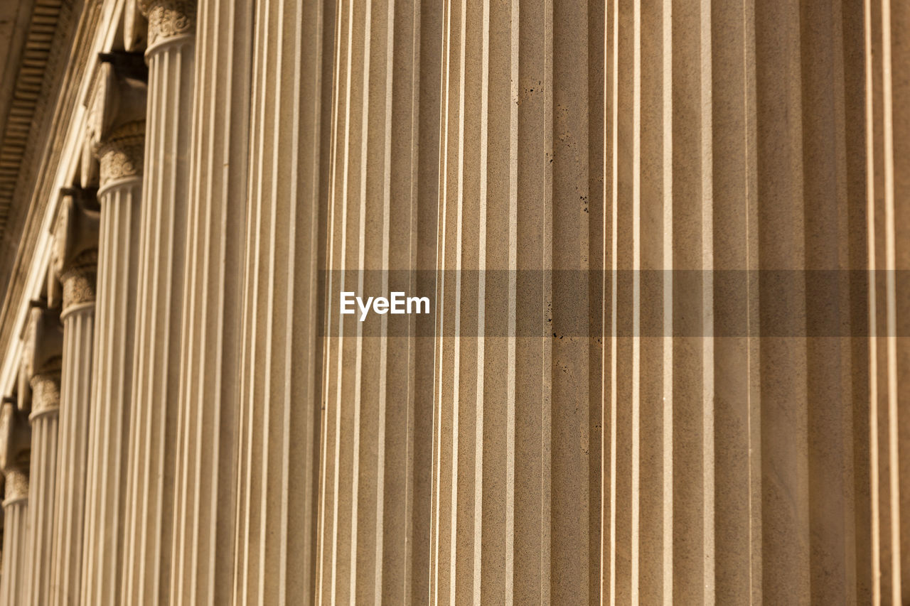 Row of columns of the treasury department building in washington, dc - abstract closeup, background