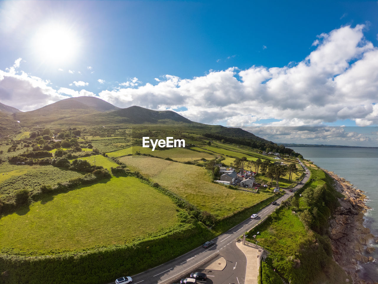 SCENIC VIEW OF LANDSCAPE AND ROAD AGAINST SKY