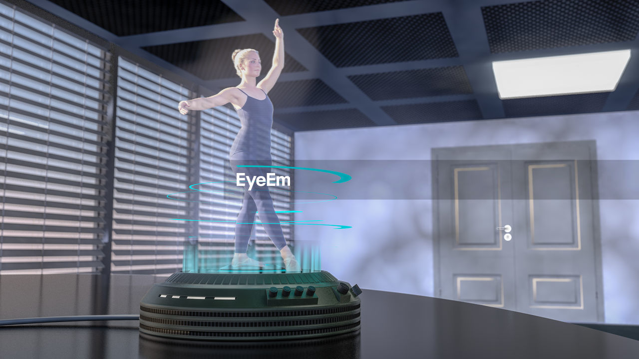Three dimensional hologram image of woman dancing on technology
