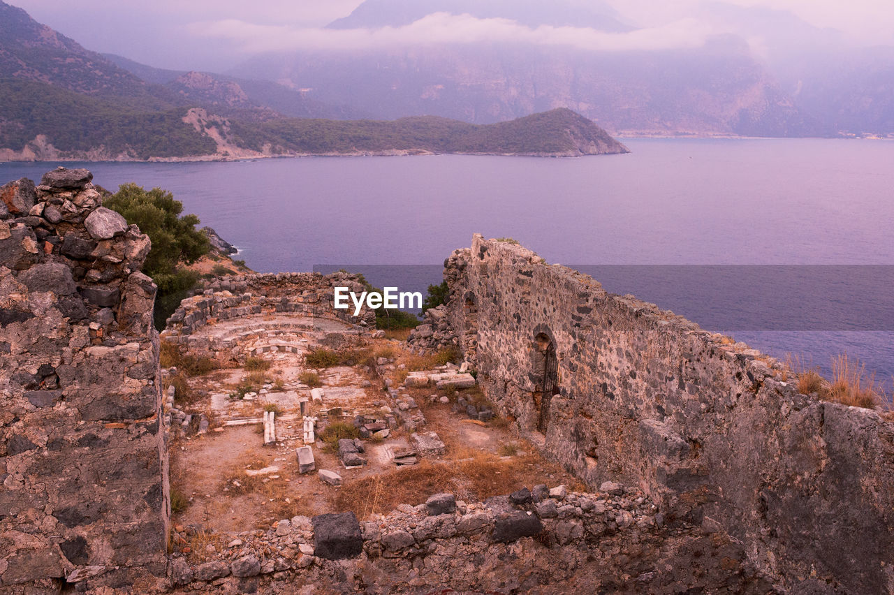 High angle view of old ruins against sea at san nicolas island