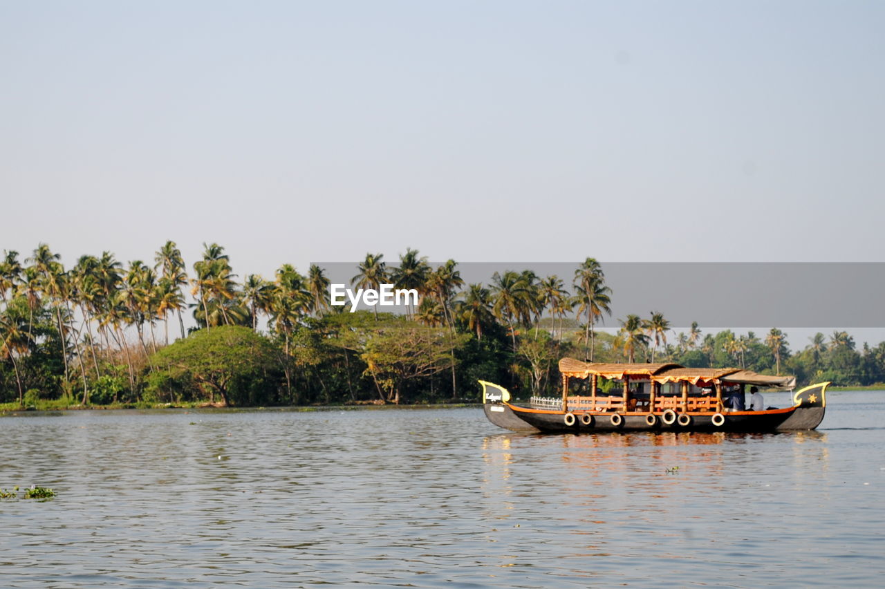 SCENIC VIEW OF BOATS IN SEA