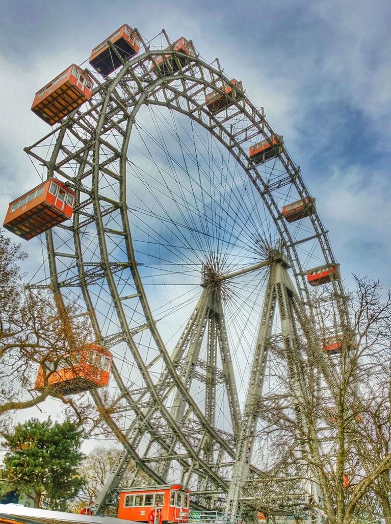 LOW ANGLE VIEW OF FERRIS WHEEL AGAINST SKY