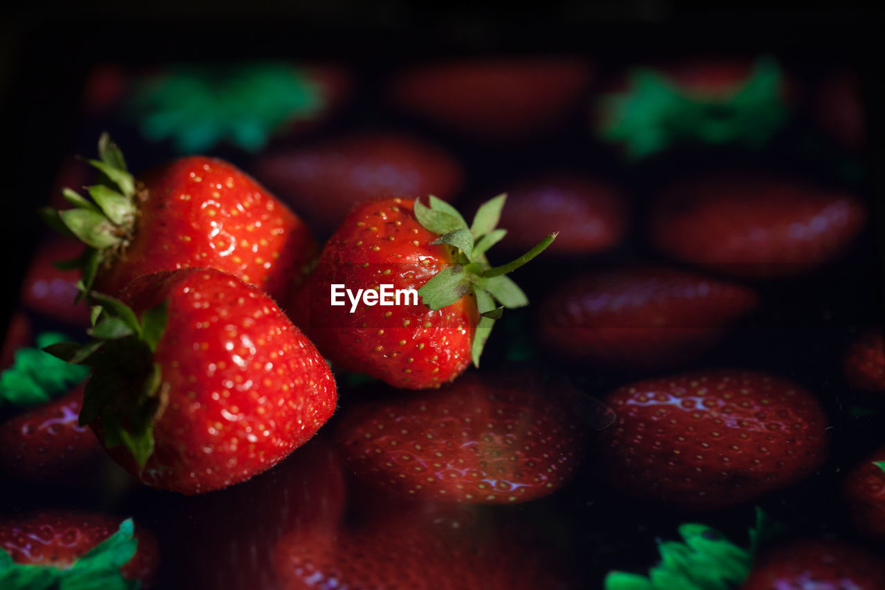 Close-up of strawberries on digital tablet