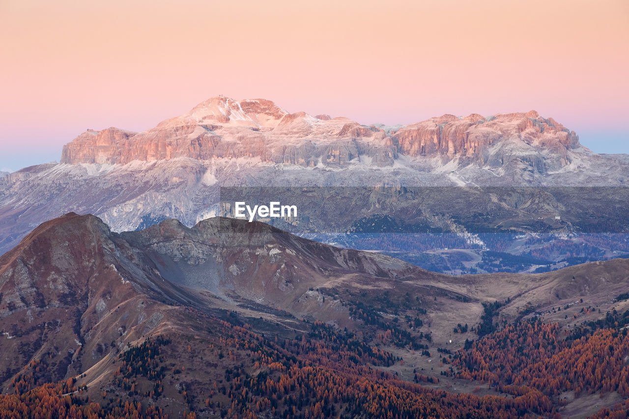 Scenic view of mountain against sky during sunset