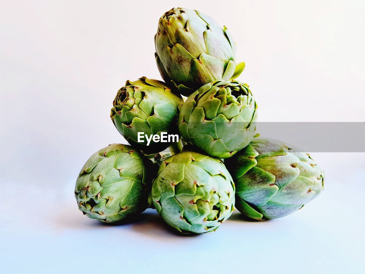 CLOSE-UP OF GREEN FRUIT