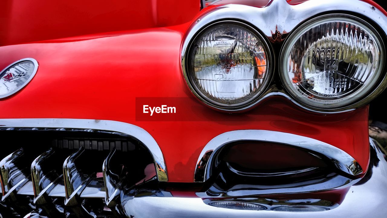 CLOSE-UP OF RED CAR