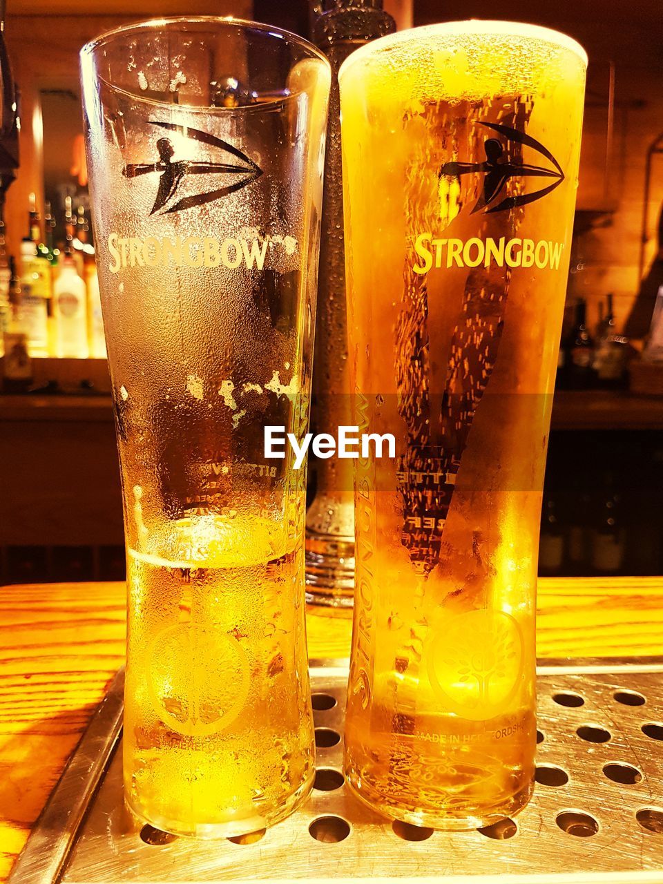 CLOSE-UP OF BEER GLASSES