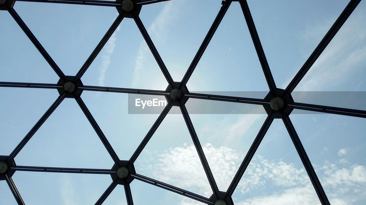 Full frame shot of sky seen through patterned glass window