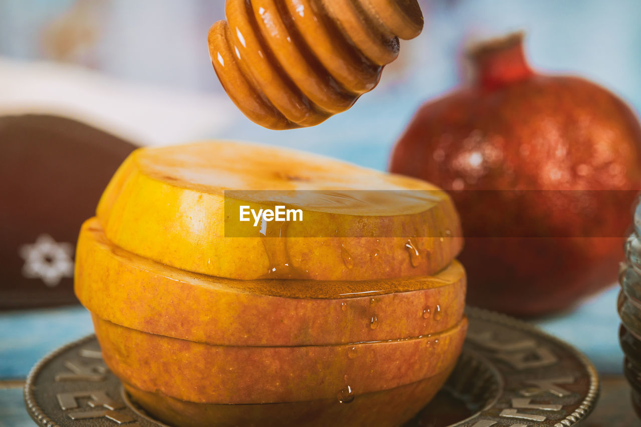 CLOSE-UP OF PUMPKIN IN CONTAINER