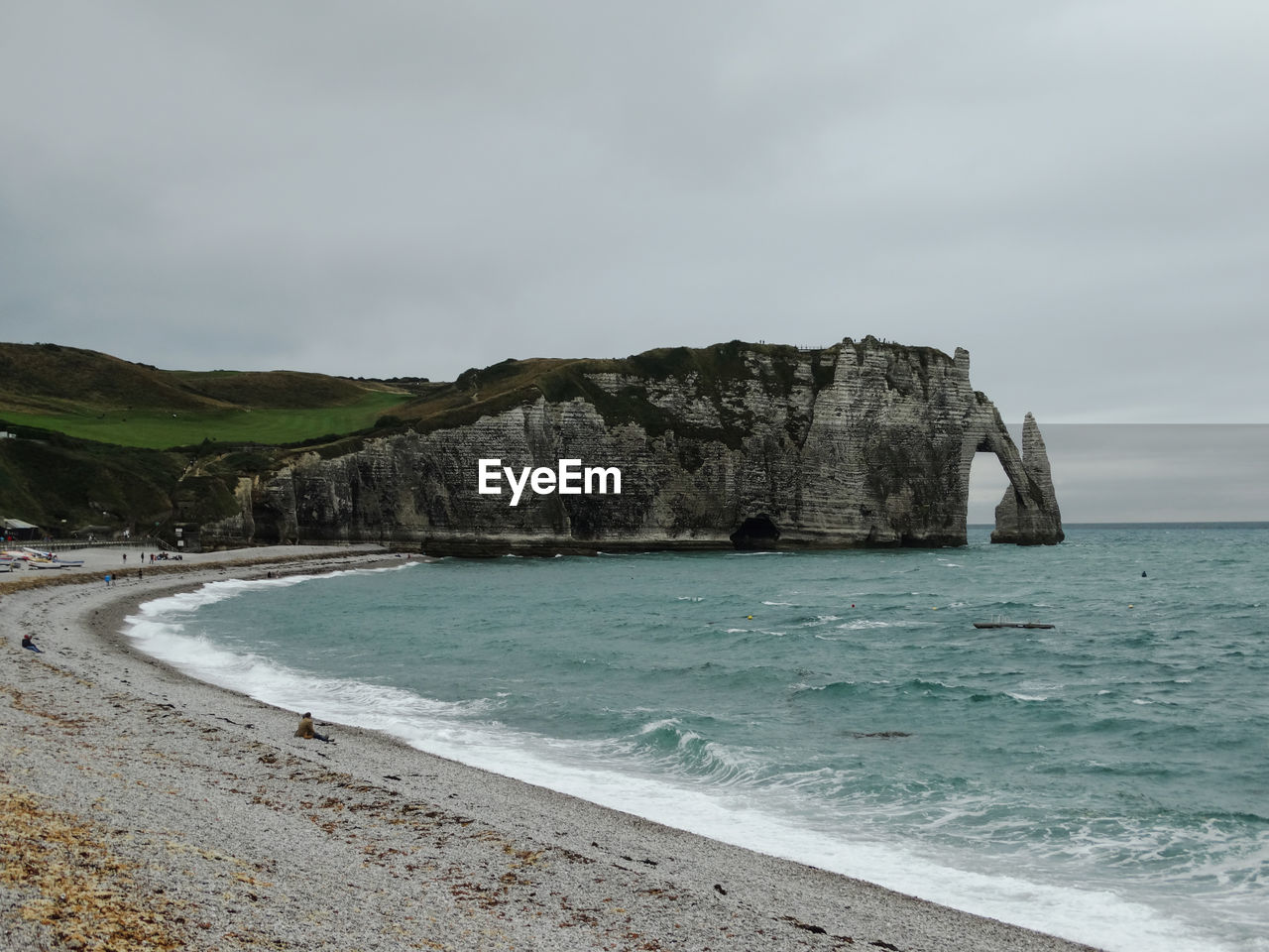 SCENIC VIEW OF SEA AND ROCKS AGAINST SKY