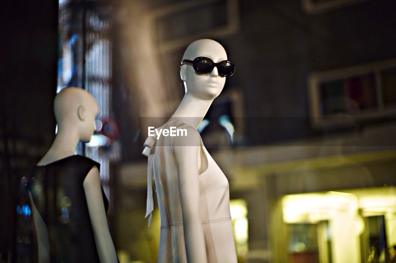 Mannequins on display against blurred background