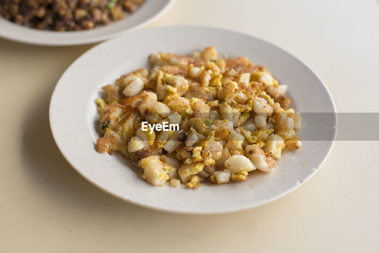 High angle view of food served in plate on table