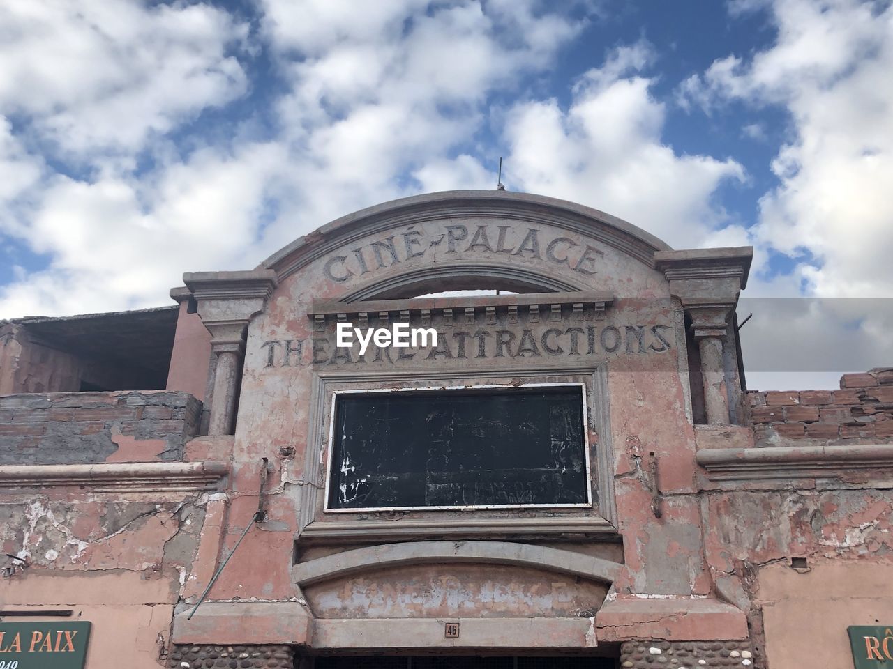 Low angle view of old building against sky