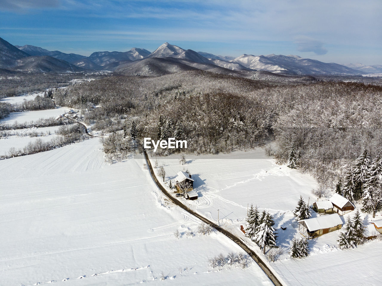 Winter in wooden village in lika, croatia