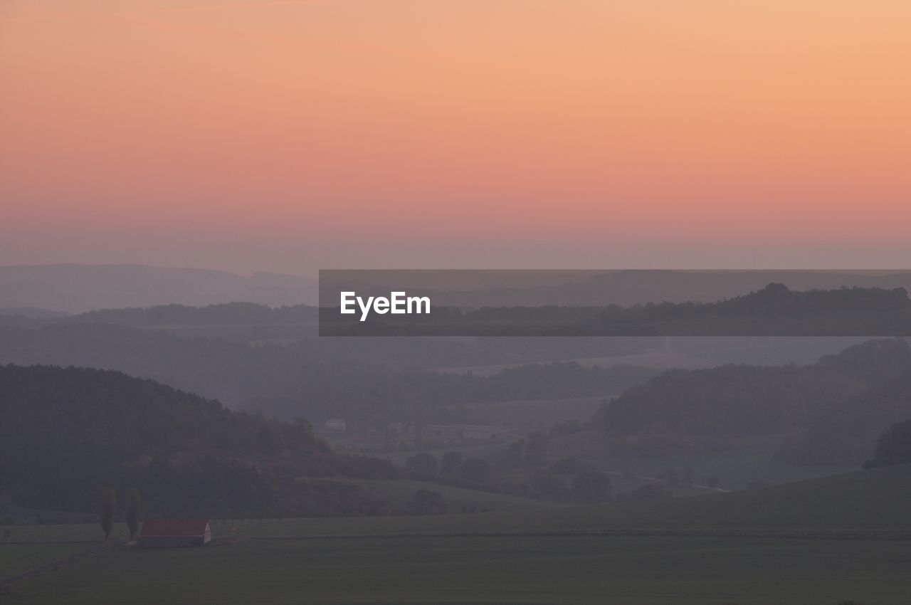 Scenic view of landscape during sunset