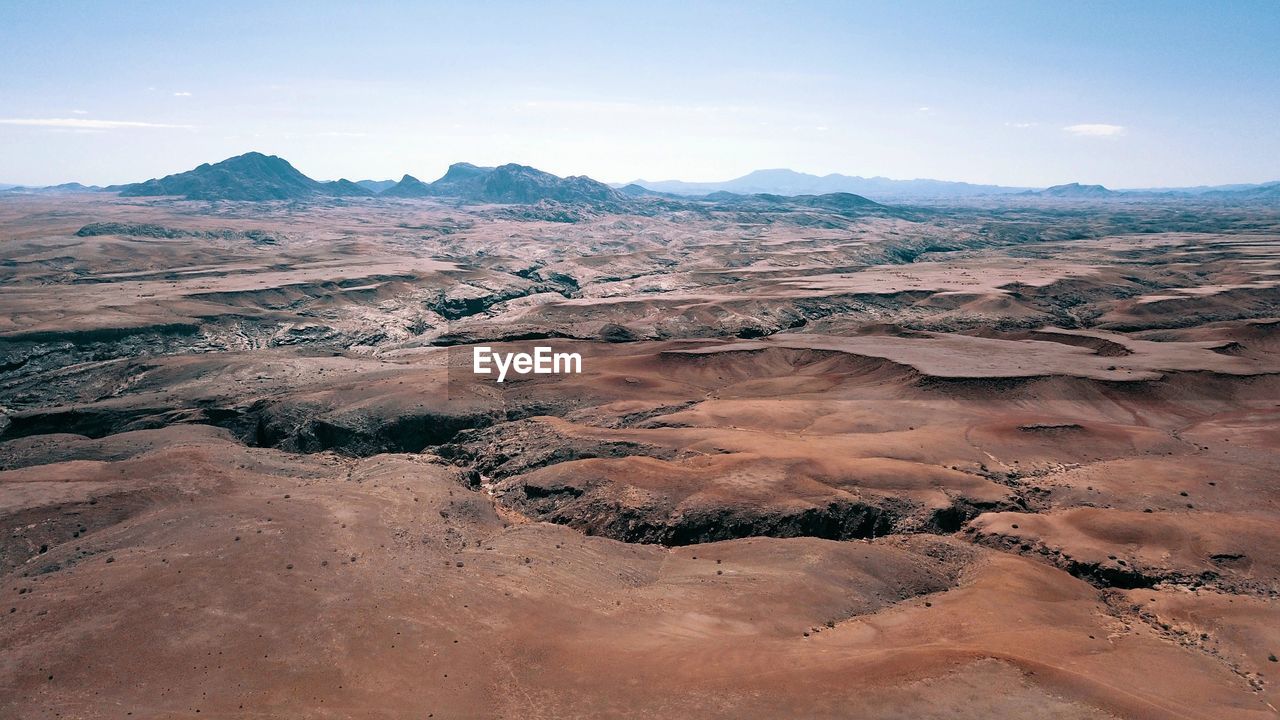 Scenic view of dramatic landscape against sky