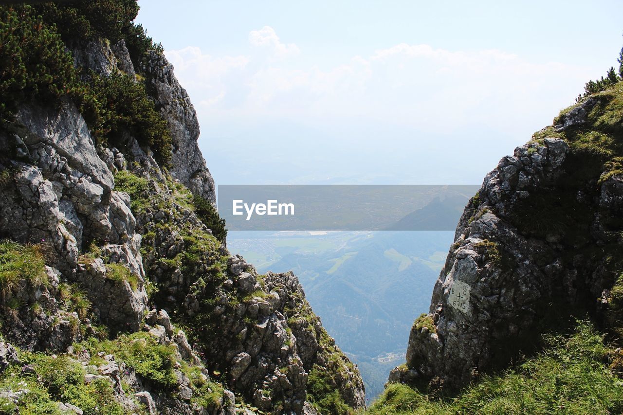 SCENIC VIEW OF MOUNTAIN AGAINST SKY