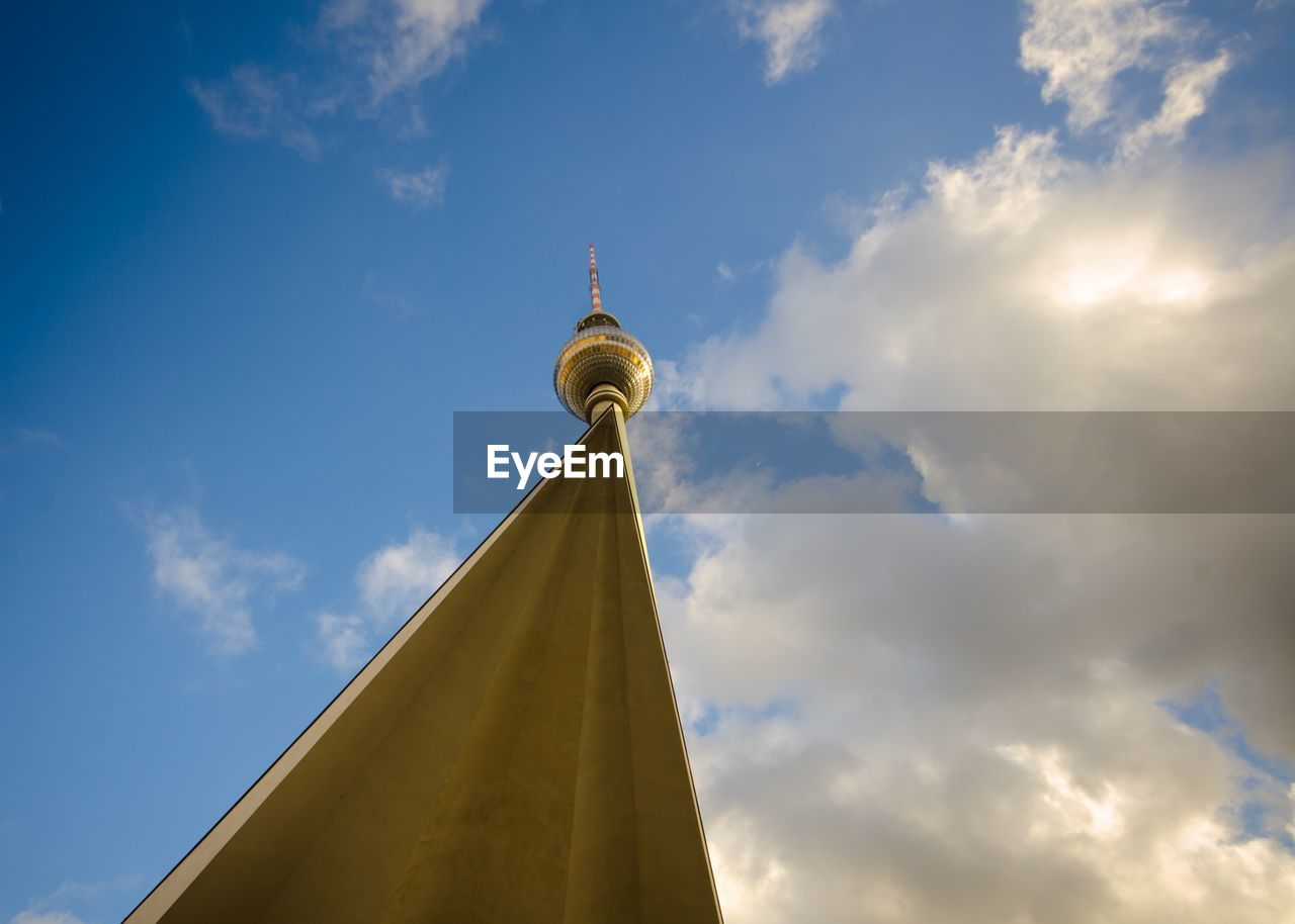 Low angle view of fernsehturm against sky in city