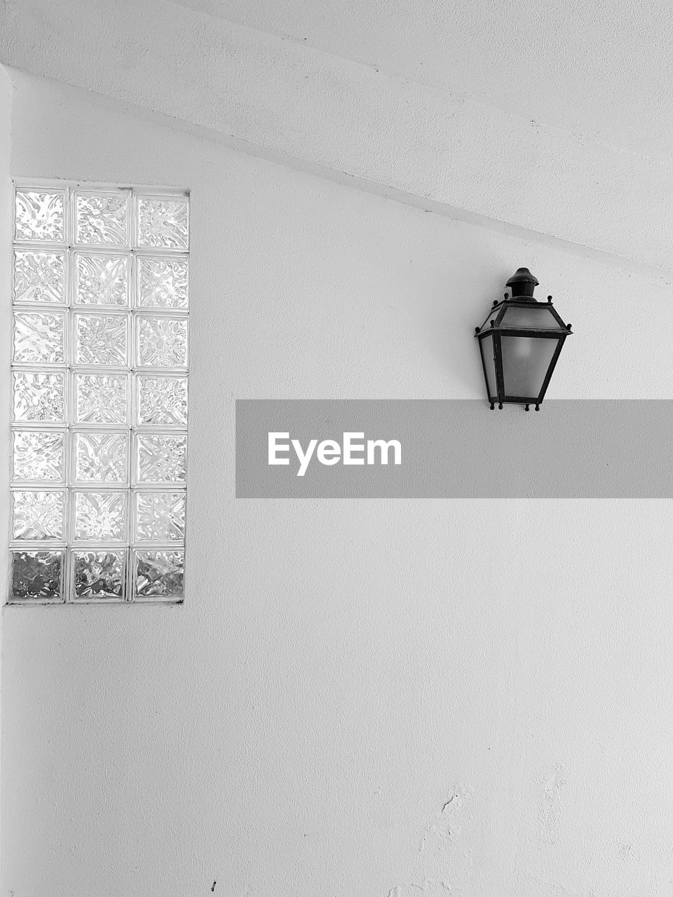 LOW ANGLE VIEW OF ILLUMINATED ELECTRIC LAMP
