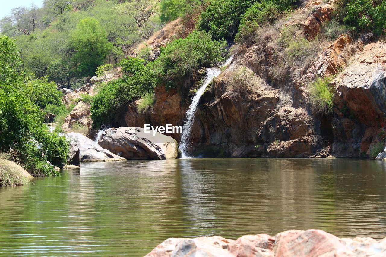 Waterfall flowing through rocks